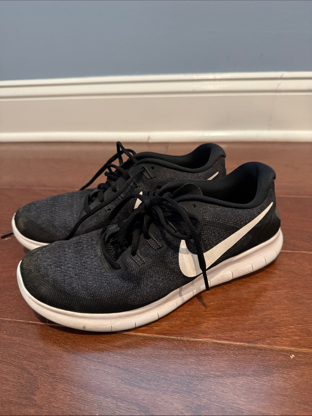 Nike women’s Black and White Athletic Running Shoes free RN size 10